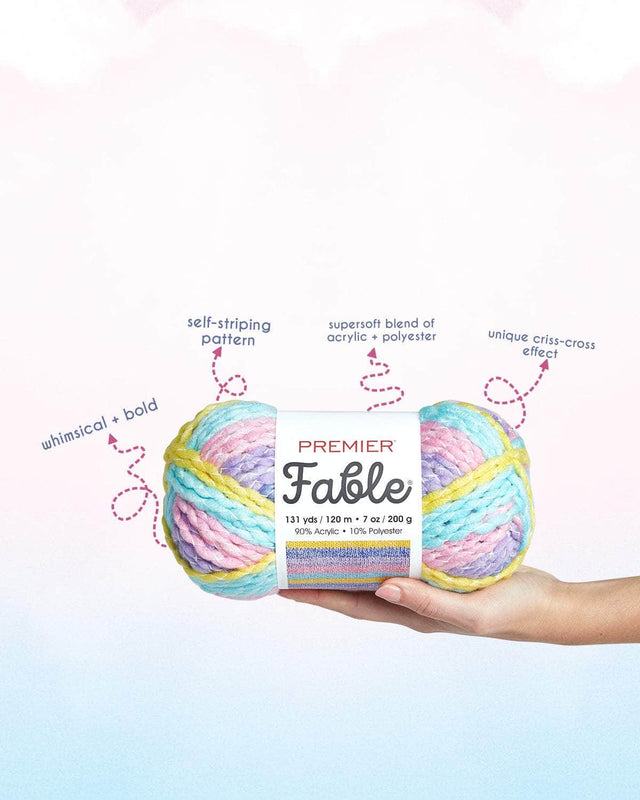 Woman Holding fable yarn with facts about the yarn as arrows with text.