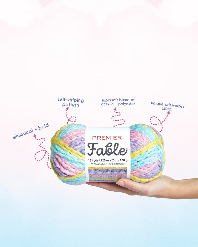 Woman Holding fable yarn with facts about the yarn as arrows with text.