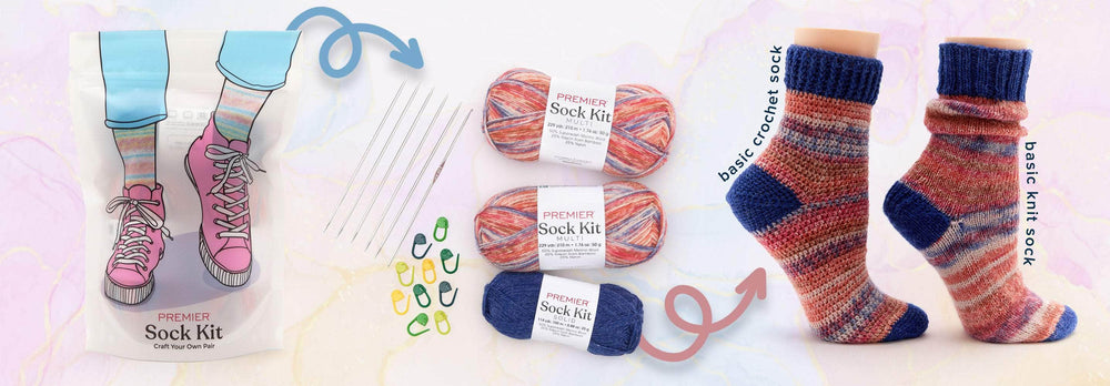 Premier Sock kit display including three skeins of yarn, knitting needles, crochet hooks, stitch markers, and finished socks. Package, needles, and sock examples shown on a light background.